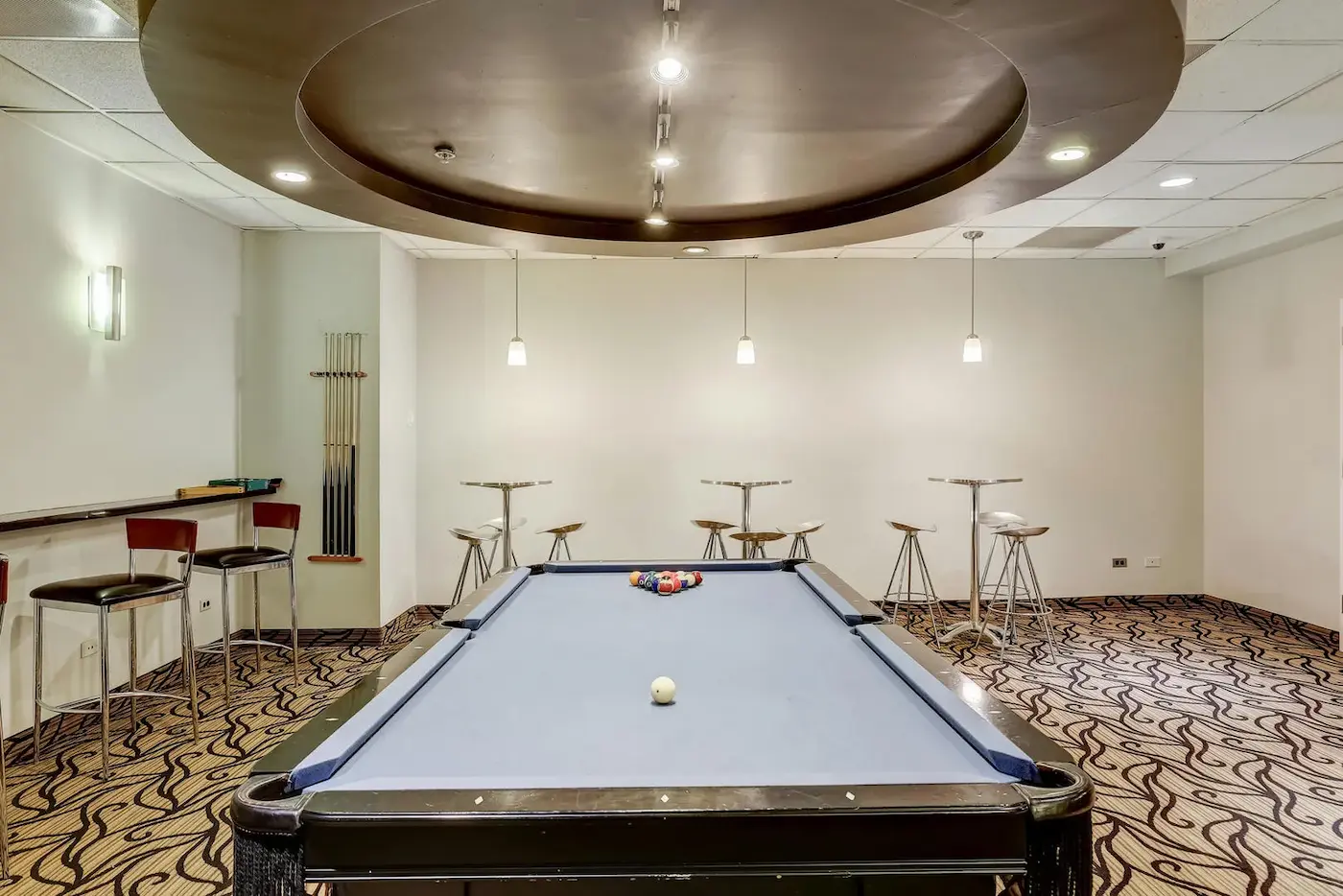 Group of professionals enjoying a luxury furnished corporate apartment in Downtown Chicago.