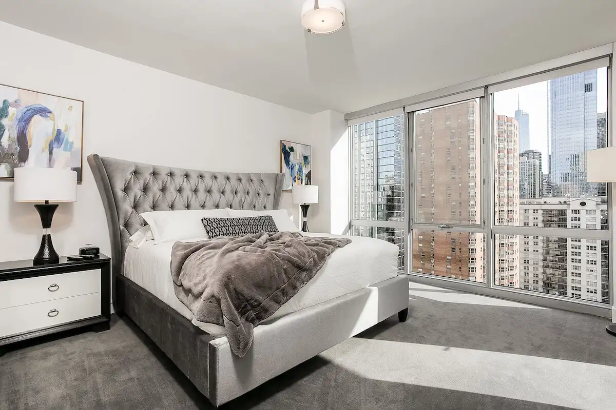 Luxury two-bedroom apartment interior in Chicago with modern bedroom.