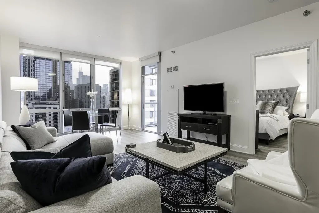 Group of professionals enjoying a luxury furnished corporate apartment in Downtown Chicago.