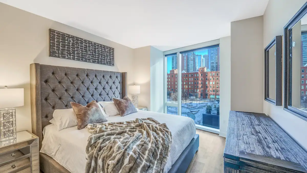 Group of professionals enjoying a luxury furnished corporate apartment in Downtown Chicago.