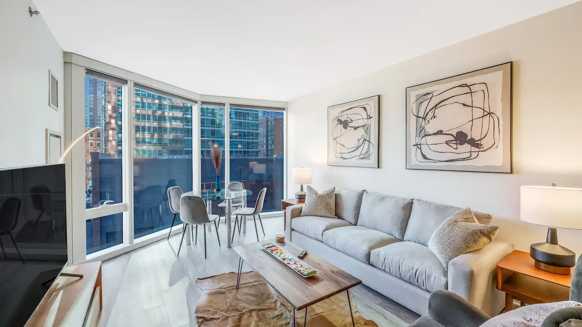 Group of professionals enjoying a luxury furnished corporate apartment in Downtown Chicago.