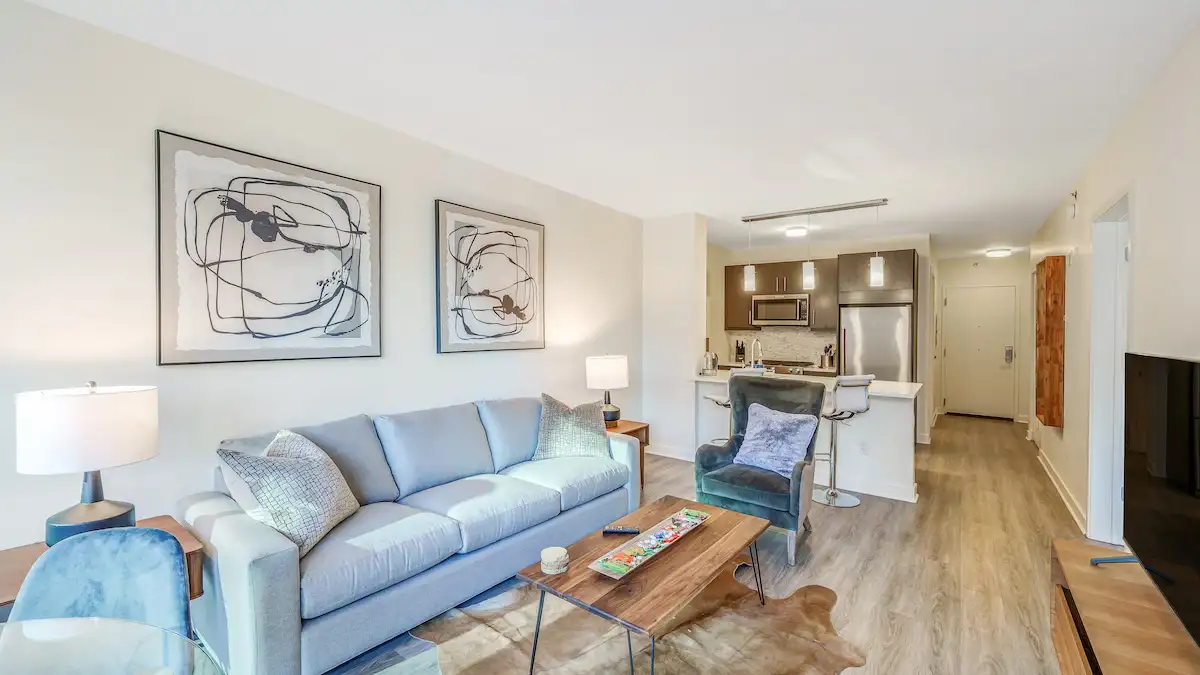 Group of professionals enjoying a luxury furnished corporate apartment in Downtown Chicago.