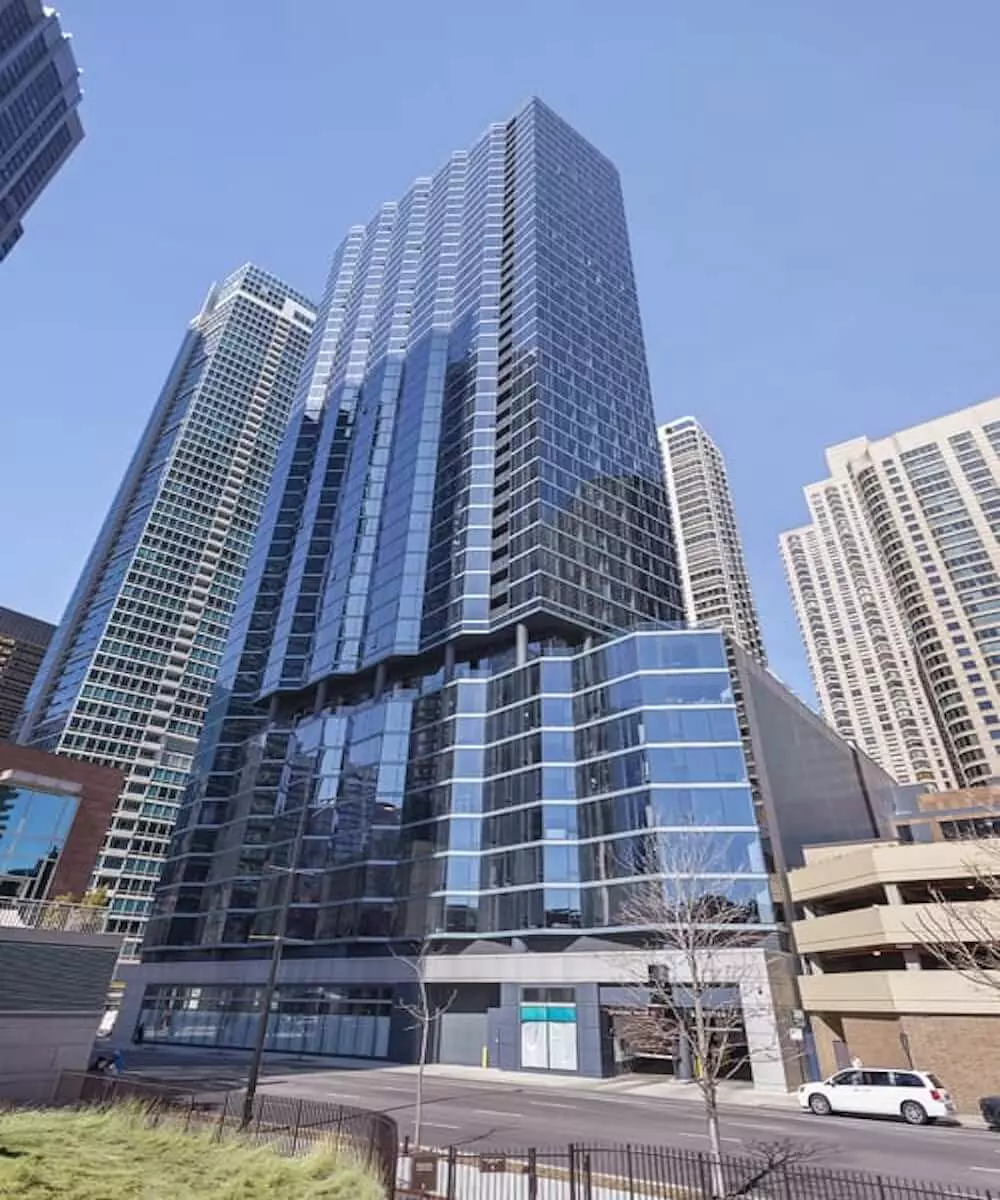 Group of professionals enjoying a luxury furnished corporate apartment in Downtown Chicago.