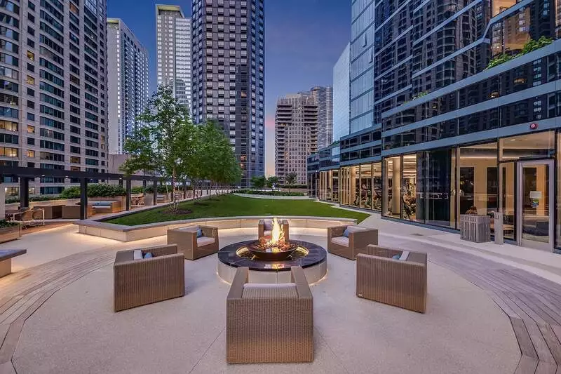 Group of professionals enjoying a luxury furnished corporate apartment in Downtown Chicago.