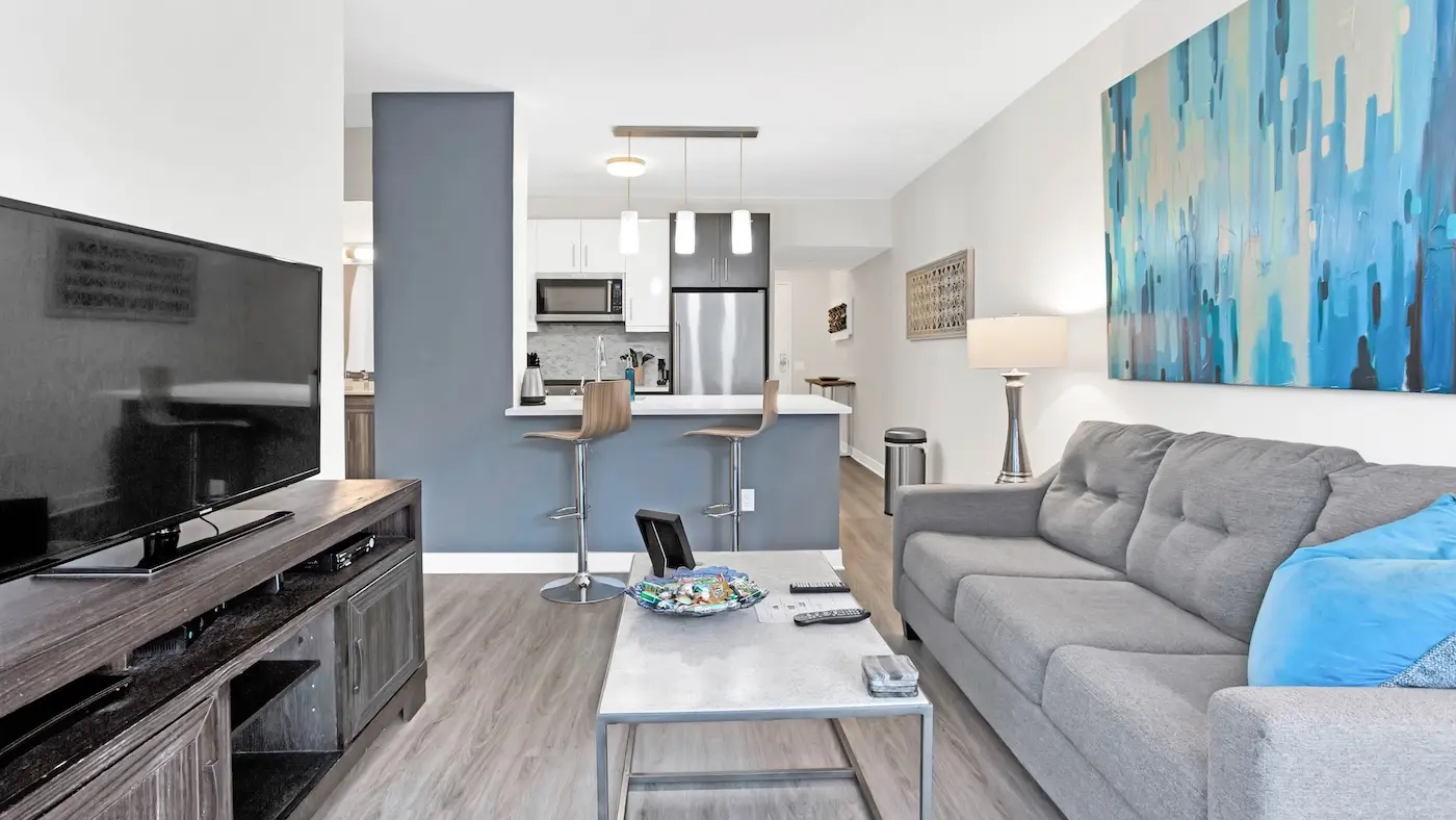 Group of professionals enjoying a luxury furnished corporate apartment in Downtown Chicago.