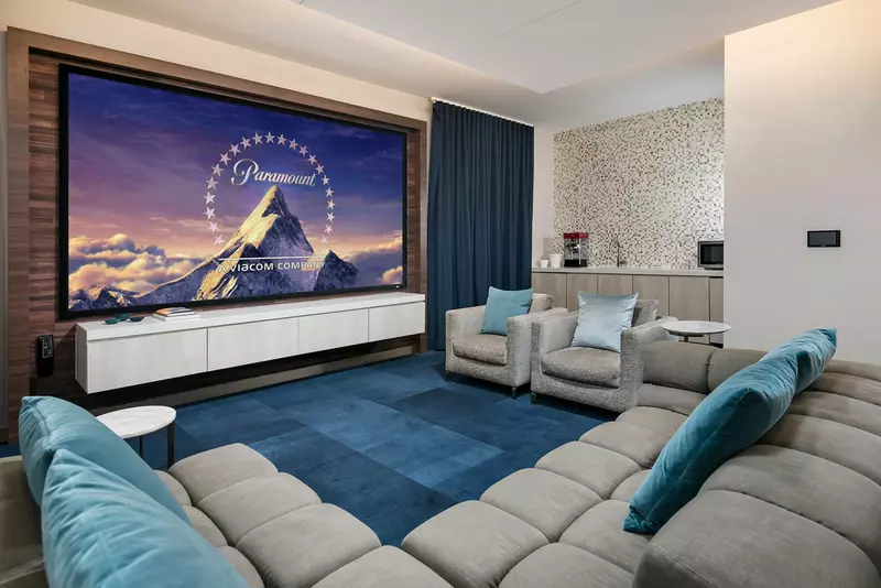 Group of professionals enjoying a luxury furnished corporate apartment in Downtown Chicago.