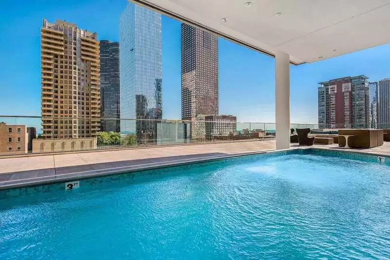 Group of professionals enjoying a luxury furnished corporate apartment in Downtown Chicago.