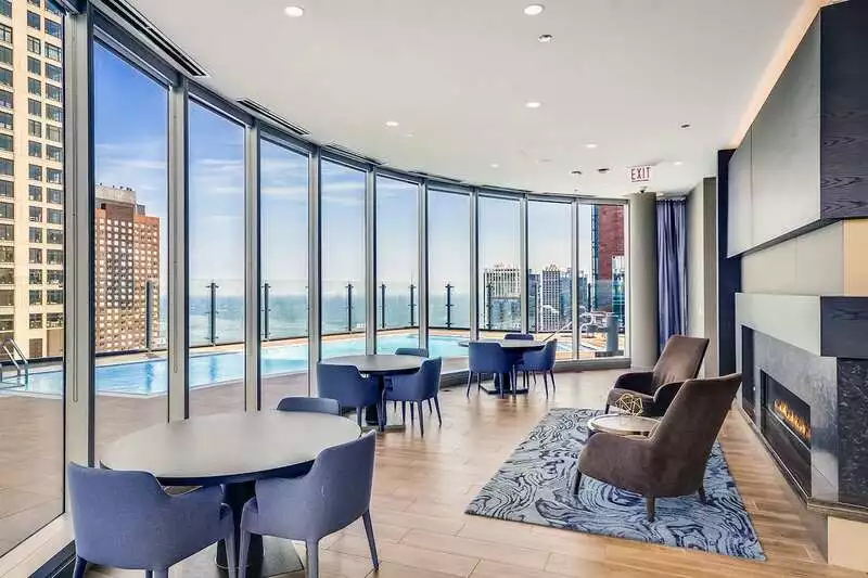 Group of professionals enjoying a luxury furnished corporate apartment in Downtown Chicago.