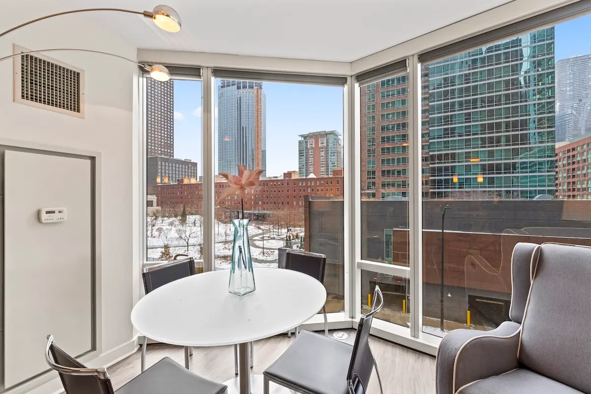 Group of professionals enjoying a luxury furnished corporate apartment in Downtown Chicago.