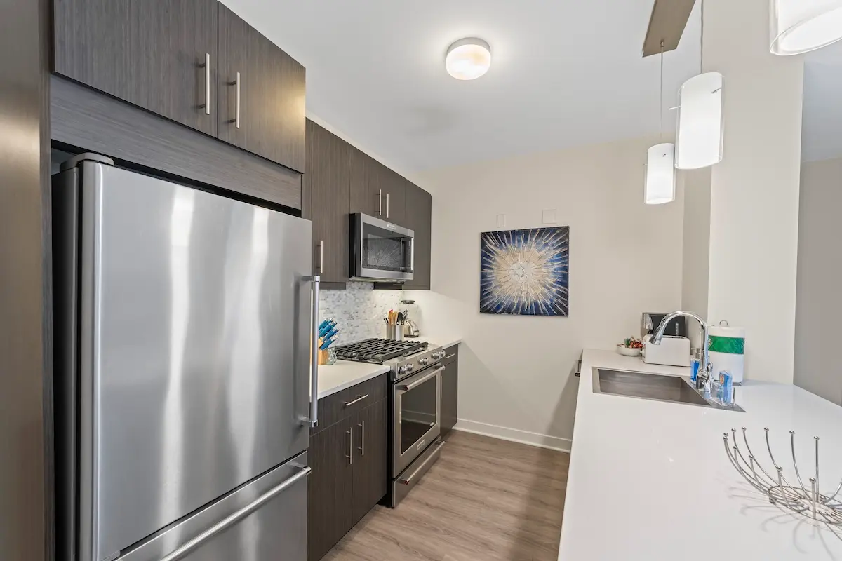 Group of professionals enjoying a luxury furnished corporate apartment in Downtown Chicago.