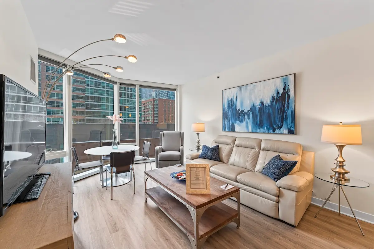 Group of professionals enjoying a luxury furnished corporate apartment in Downtown Chicago.