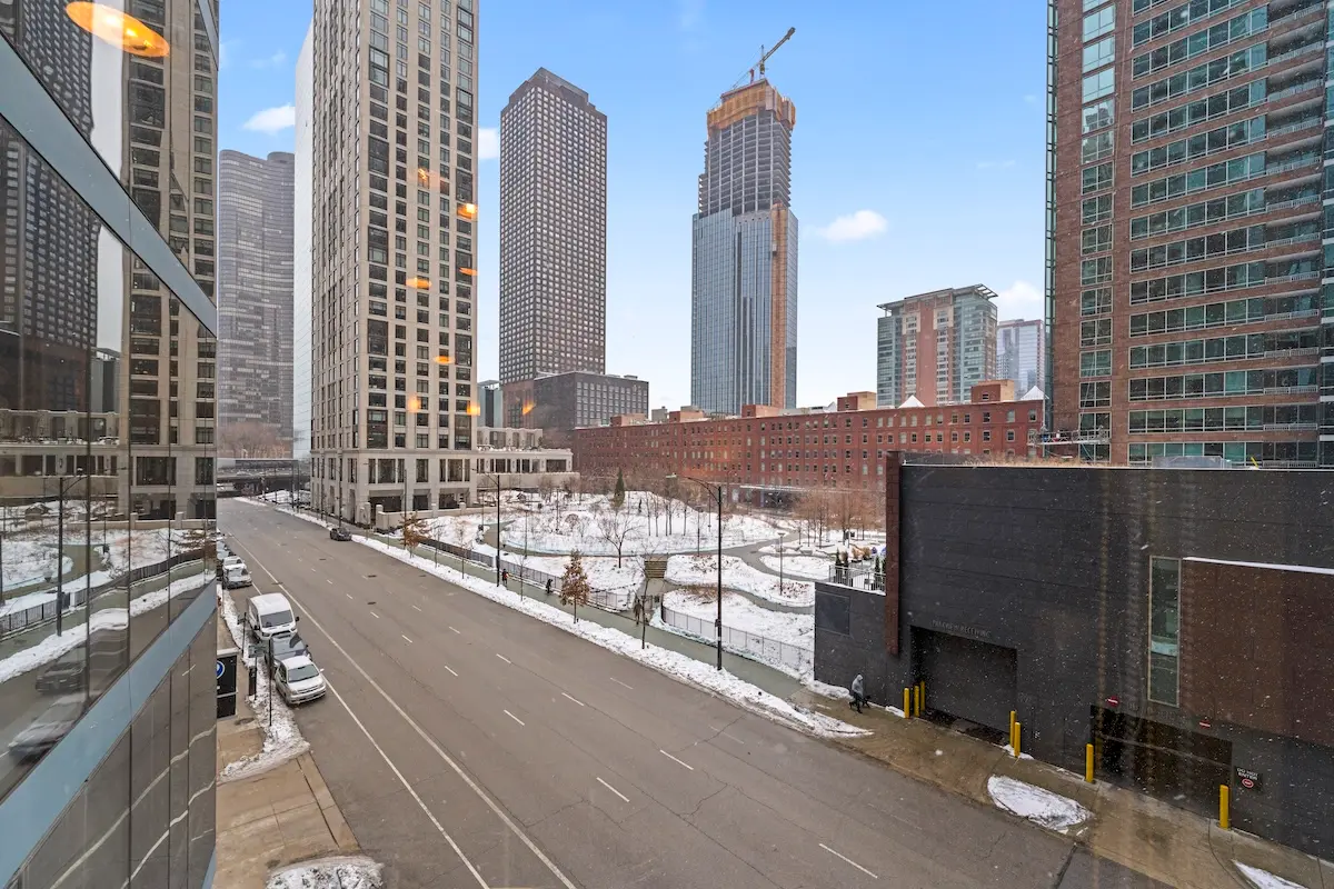 Group of professionals enjoying a luxury furnished corporate apartment in Downtown Chicago.