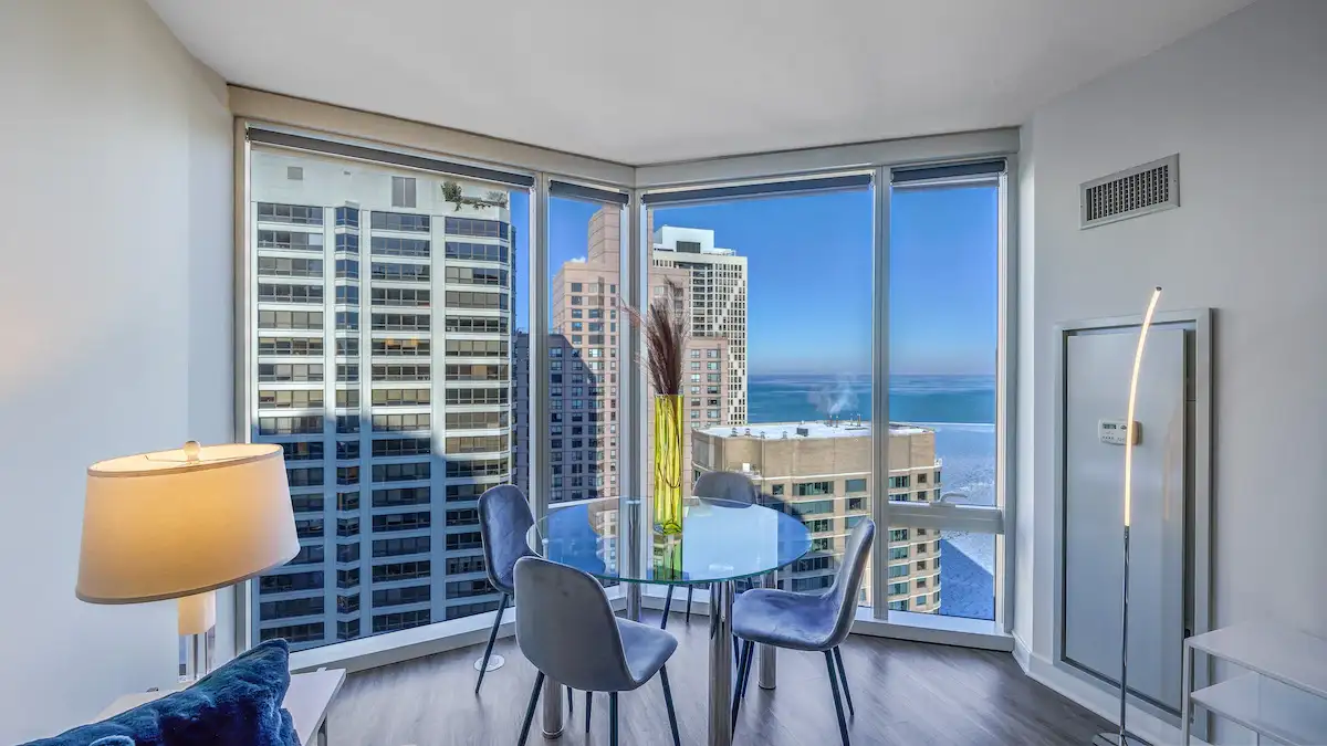 Group of professionals enjoying a luxury furnished corporate apartment in Downtown Chicago.