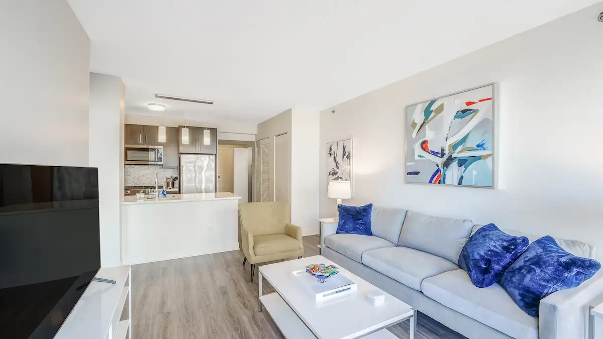 Group of professionals enjoying a luxury furnished corporate apartment in Downtown Chicago.