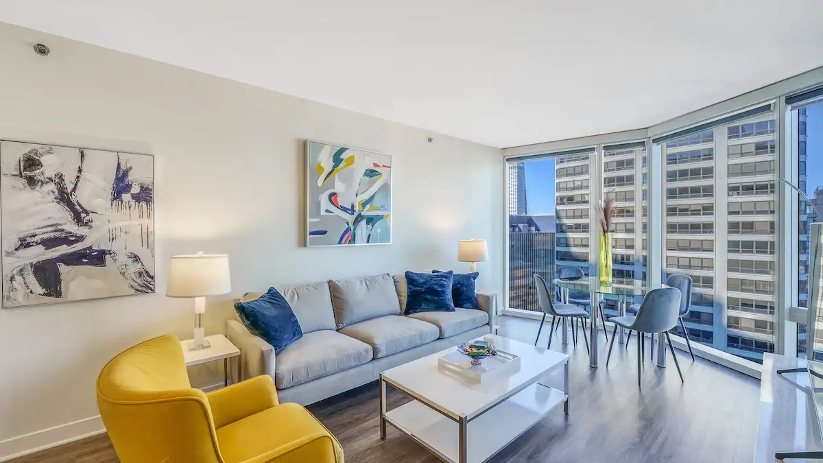 Group of professionals enjoying a luxury furnished corporate apartment in Downtown Chicago.