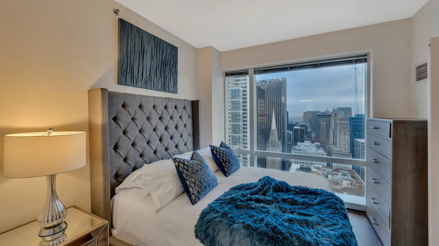 Group of professionals enjoying a luxury furnished corporate apartment in Downtown Chicago.