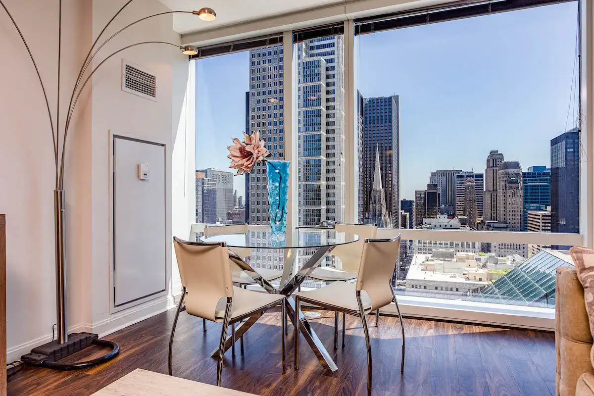 Group of professionals enjoying a luxury furnished corporate apartment in Downtown Chicago.