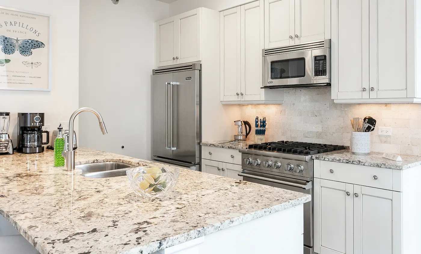 Group of professionals enjoying a luxury furnished corporate apartment in Downtown Chicago.