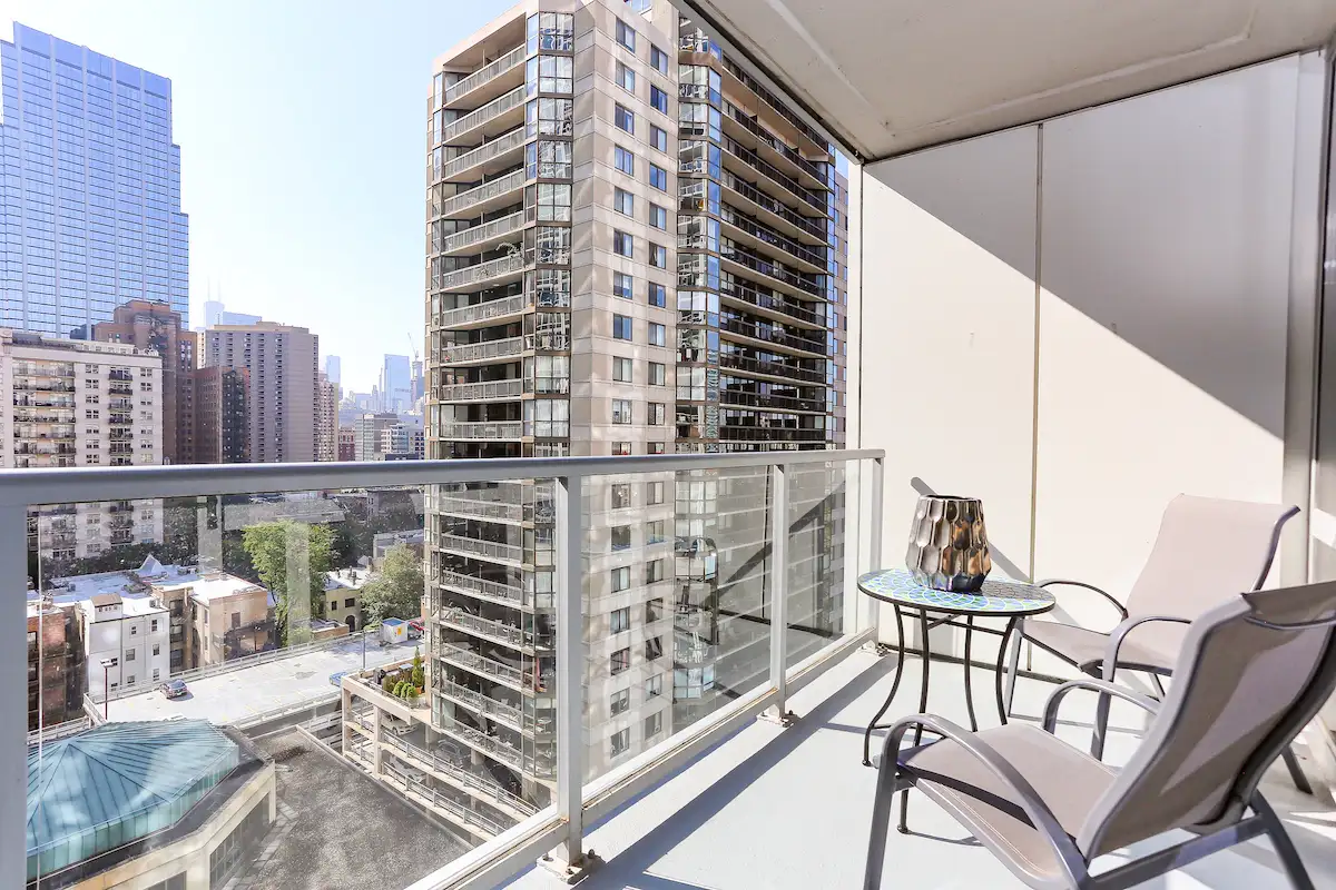 Group of professionals enjoying a luxury furnished corporate apartment in Downtown Chicago.