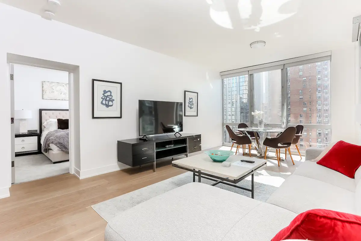 Group of professionals enjoying a luxury furnished corporate apartment in Downtown Chicago.