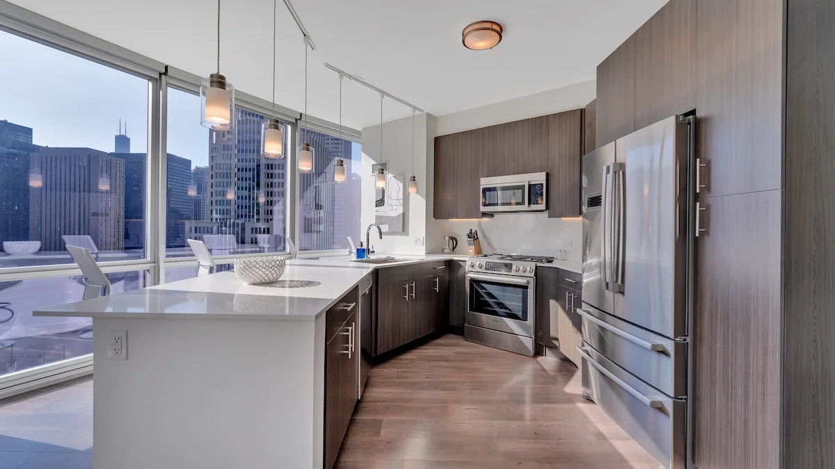 Group of professionals enjoying a luxury furnished corporate apartment in Downtown Chicago.