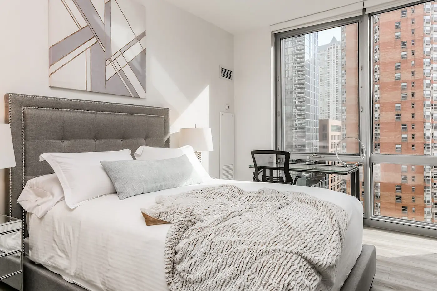 Group of professionals enjoying a luxury furnished corporate apartment in Downtown Chicago.