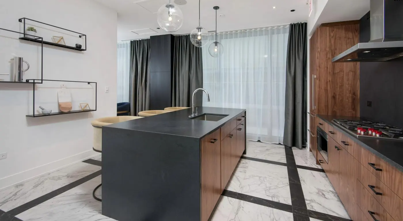 Group of professionals enjoying a luxury furnished corporate apartment in Downtown Chicago.