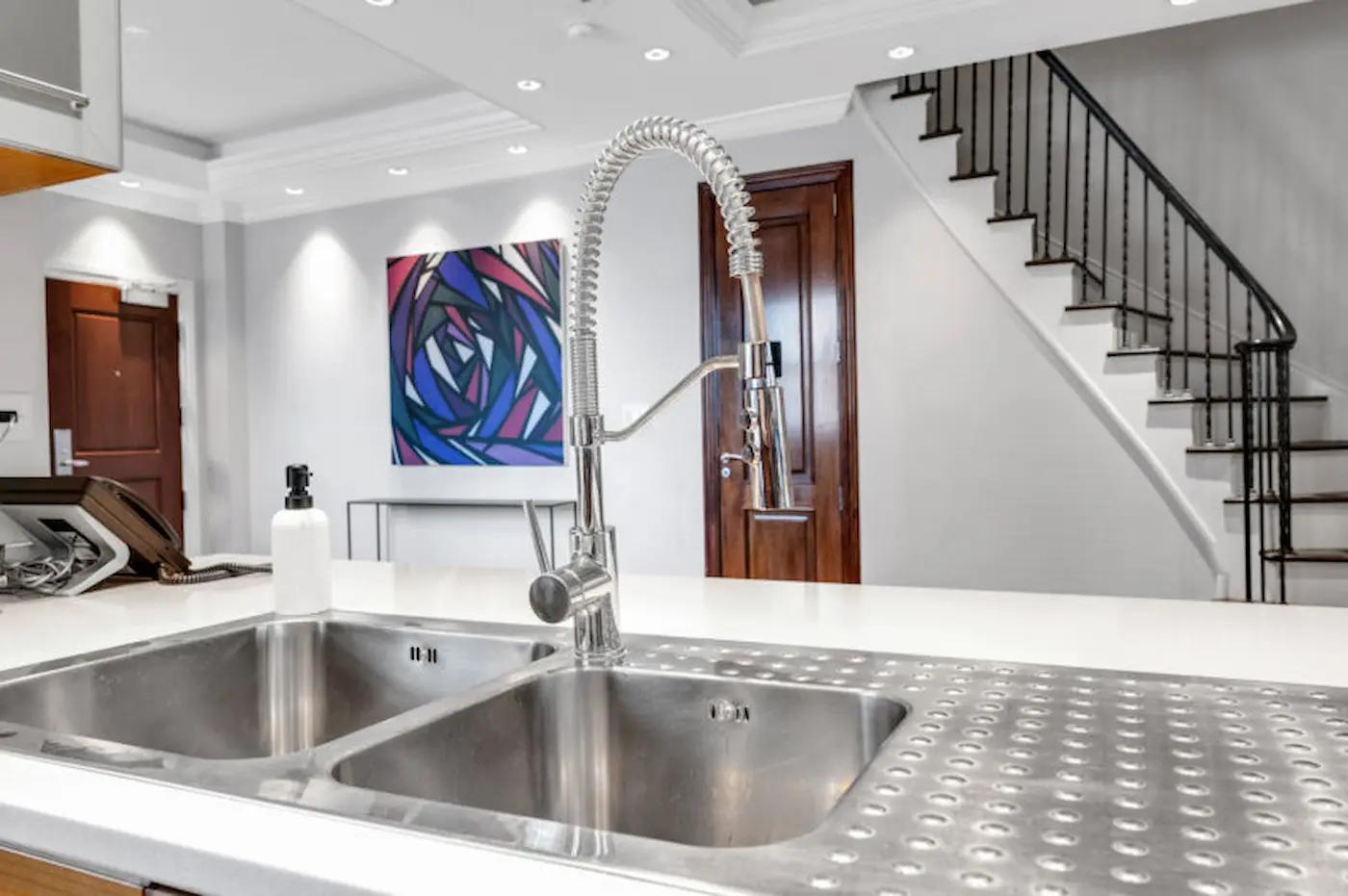 Group of professionals enjoying a luxury furnished corporate apartment in Downtown Chicago.