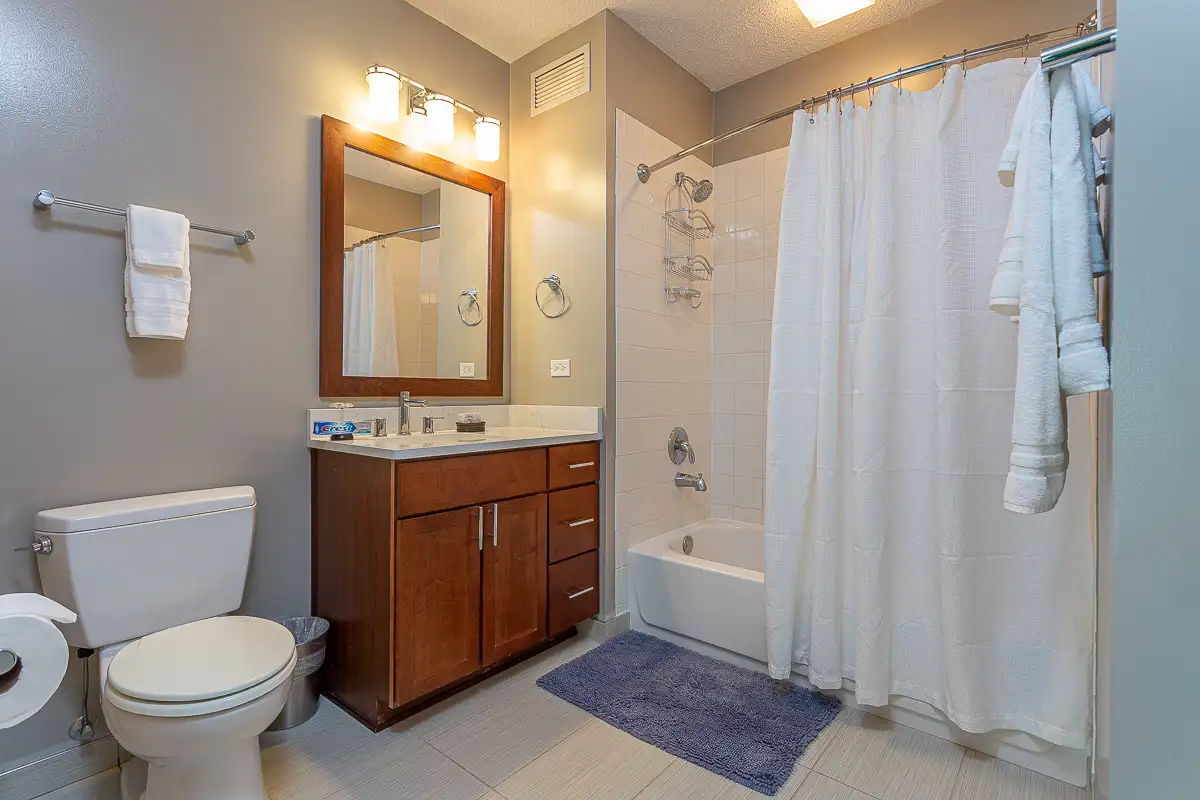 Group of professionals enjoying a luxury furnished corporate apartment in Downtown Chicago.