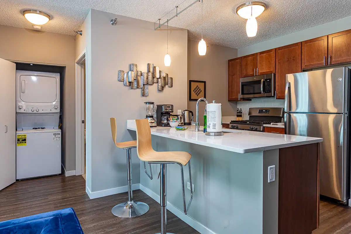 Group of professionals enjoying a luxury furnished corporate apartment in Downtown Chicago.