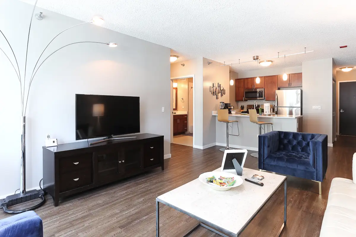 Group of professionals enjoying a luxury furnished corporate apartment in Downtown Chicago.