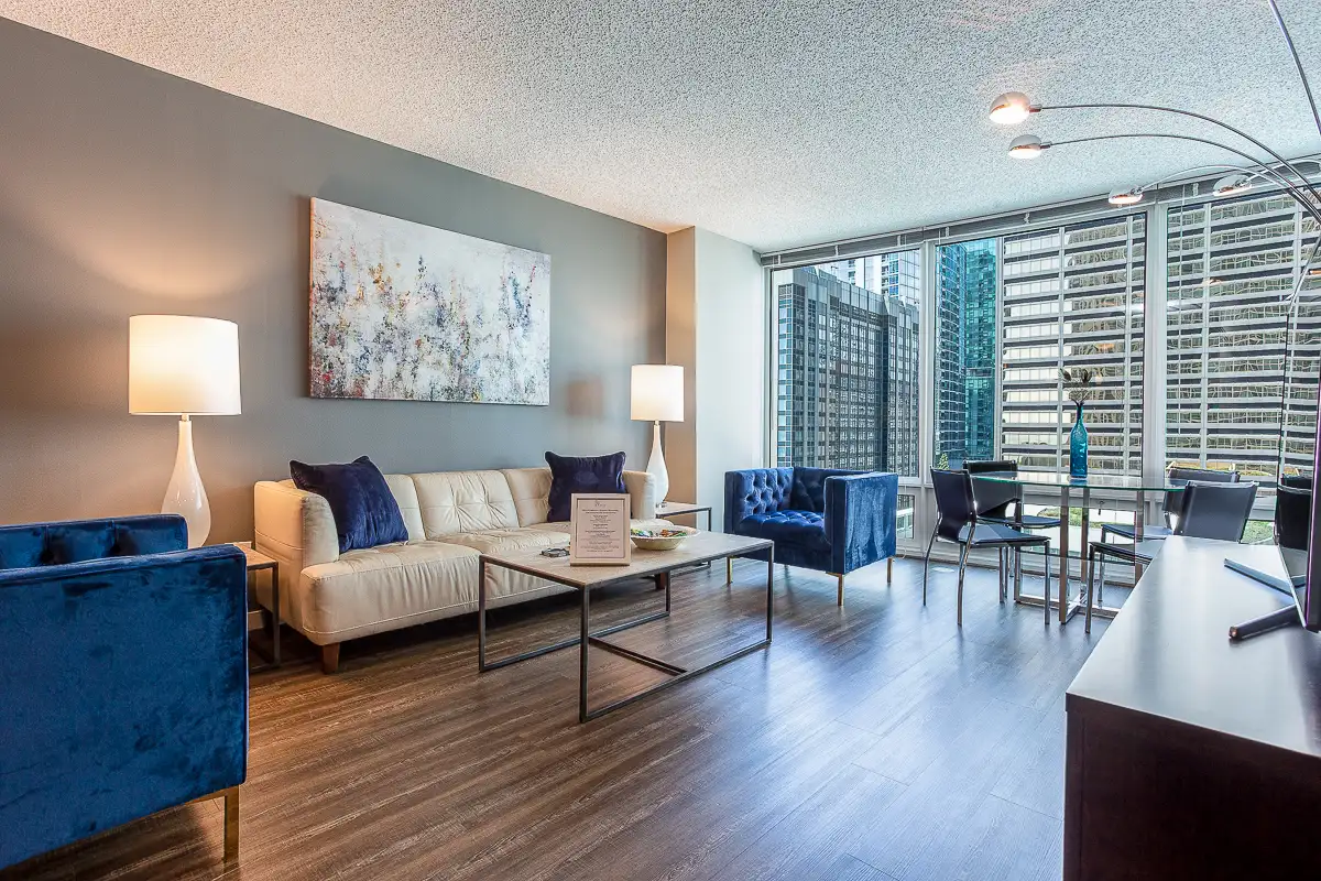 Group of professionals enjoying a luxury furnished corporate apartment in Downtown Chicago.