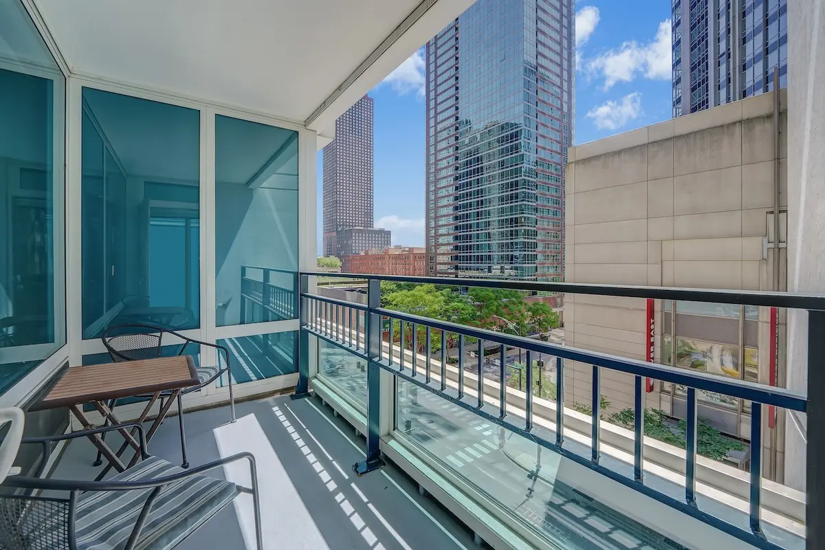 Group of professionals enjoying a luxury furnished corporate apartment in Downtown Chicago.