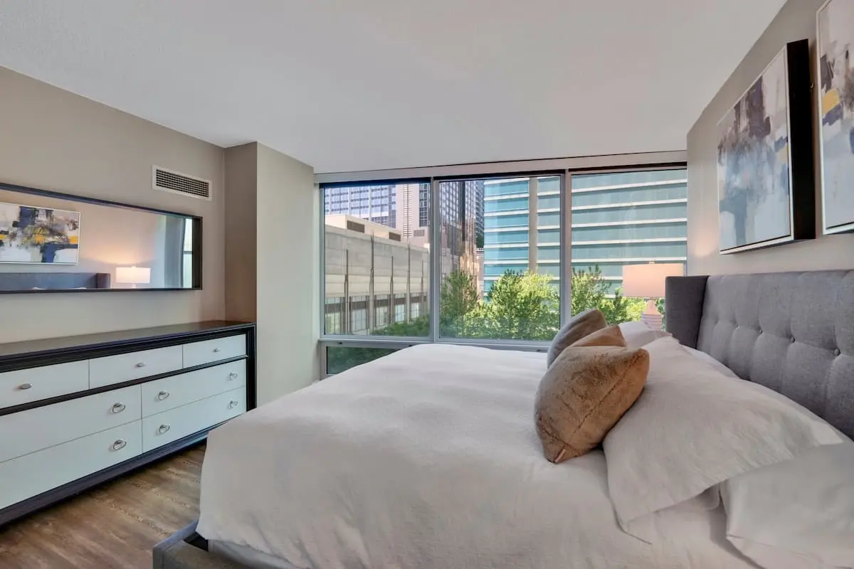 Group of professionals enjoying a luxury furnished corporate apartment in Downtown Chicago.