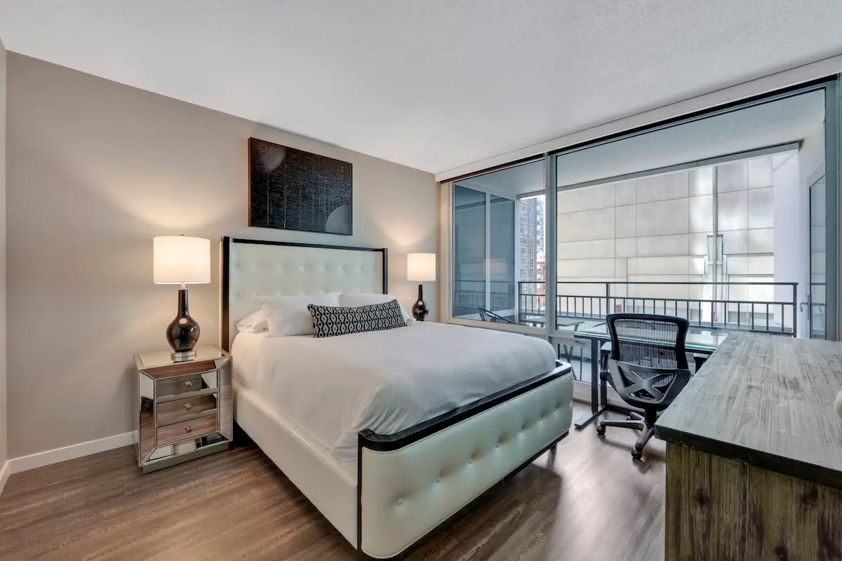 Group of professionals enjoying a luxury furnished corporate apartment in Downtown Chicago.