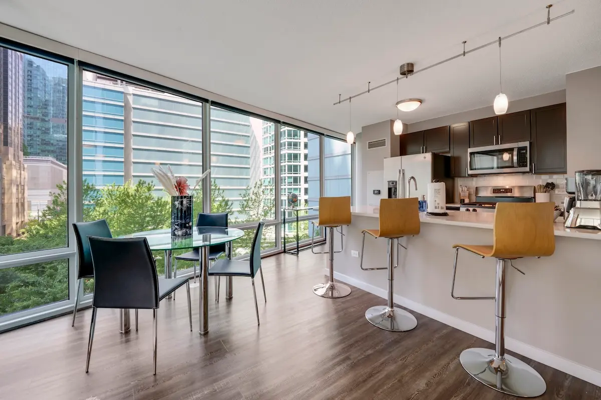 Group of professionals enjoying a luxury furnished corporate apartment in Downtown Chicago.