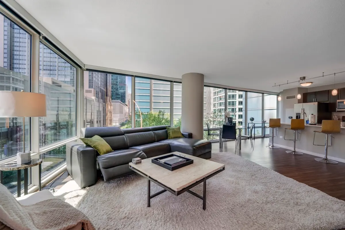 Group of professionals enjoying a luxury furnished corporate apartment in Downtown Chicago.