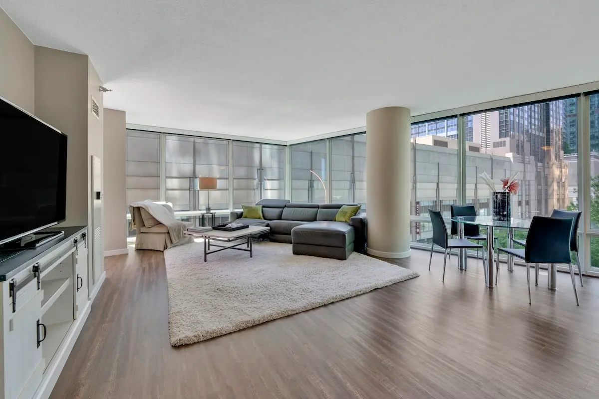 Group of professionals enjoying a luxury furnished corporate apartment in Downtown Chicago.