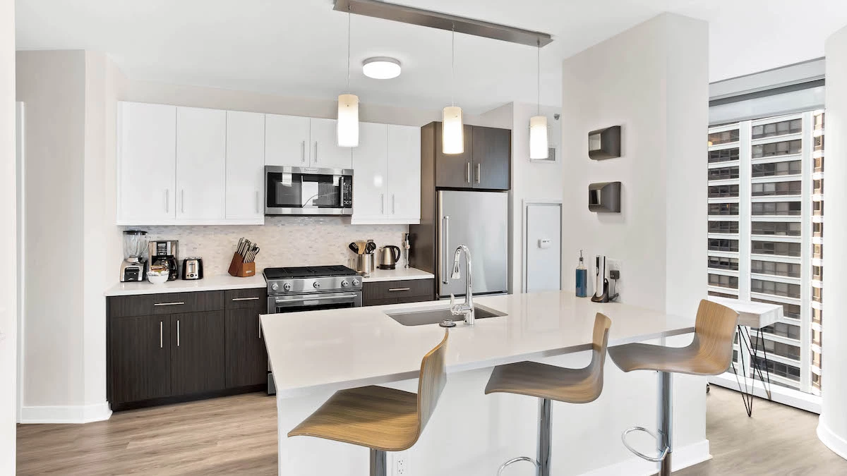 Group of professionals enjoying a luxury furnished corporate apartment in Downtown Chicago.