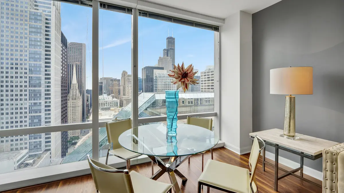 Group of professionals enjoying a luxury furnished corporate apartment in Downtown Chicago.