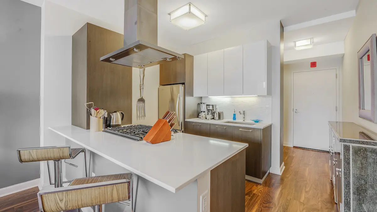 Group of professionals enjoying a luxury furnished corporate apartment in Downtown Chicago.