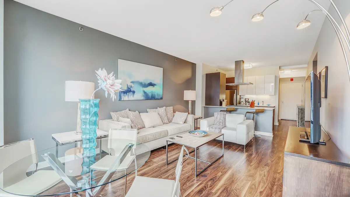 Group of professionals enjoying a luxury furnished corporate apartment in Downtown Chicago.