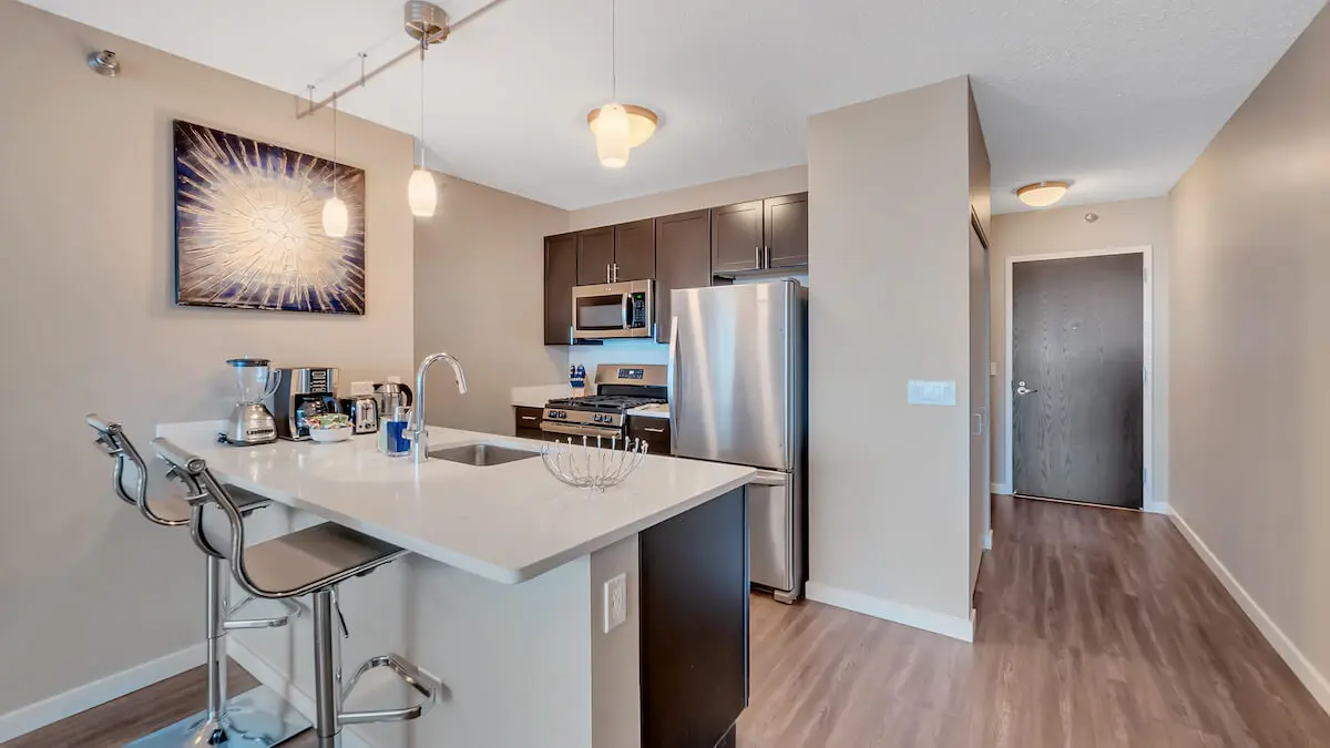 Group of professionals enjoying a luxury furnished corporate apartment in Downtown Chicago.