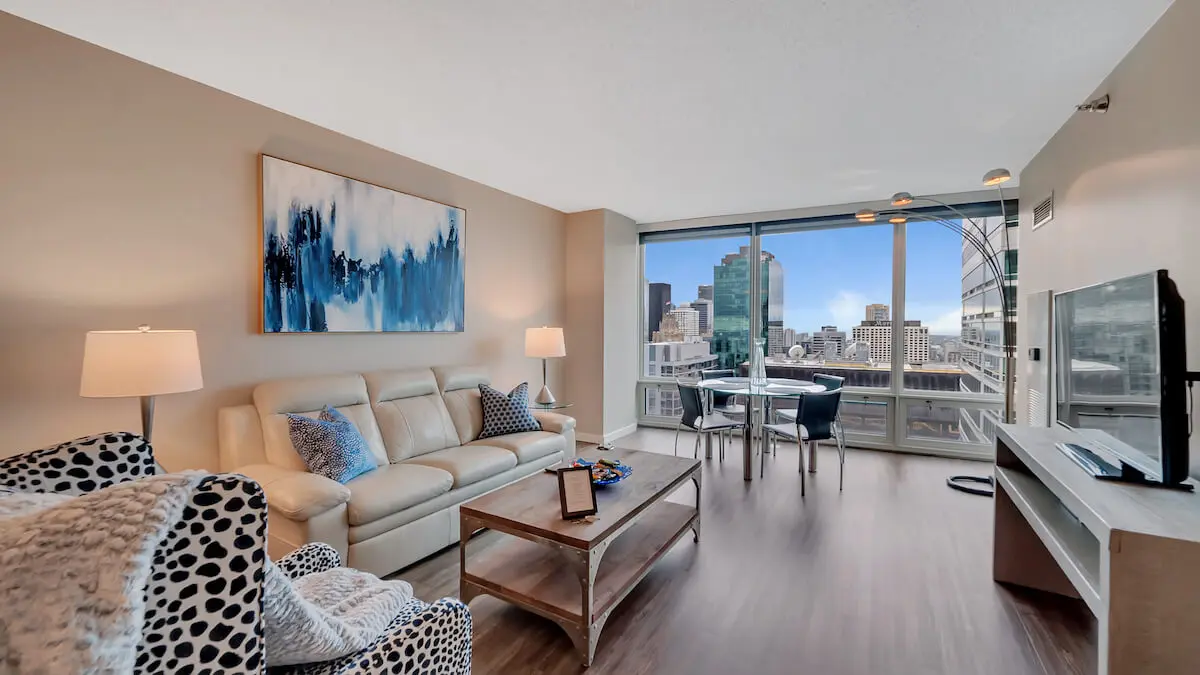 Group of professionals enjoying a luxury furnished corporate apartment in Downtown Chicago.