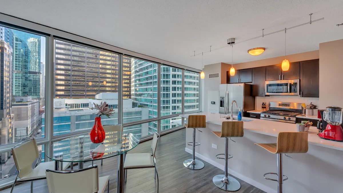 Group of professionals enjoying a luxury furnished corporate apartment in Downtown Chicago.