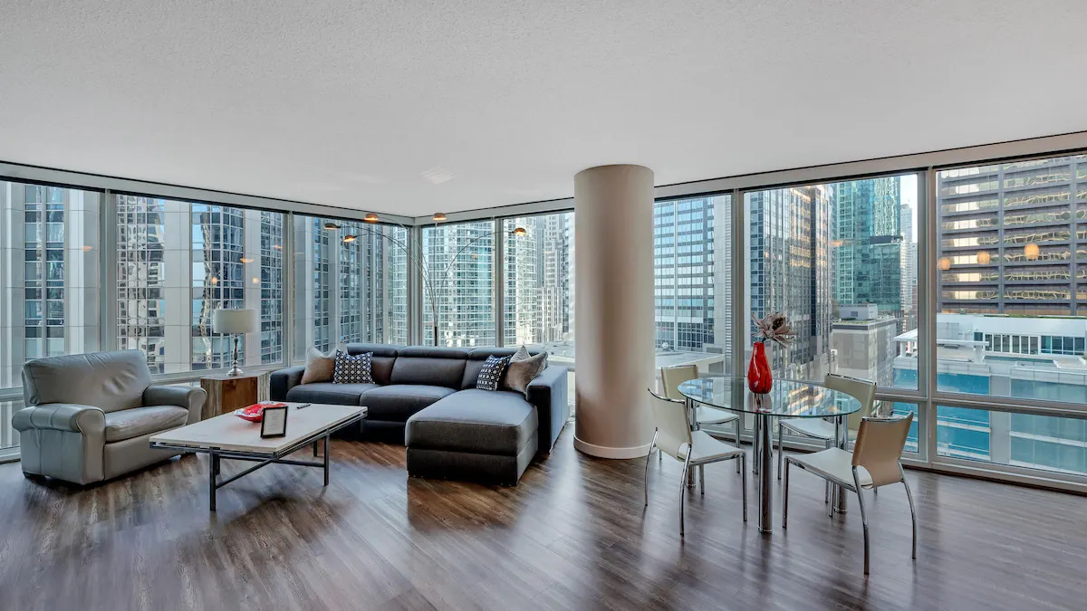 Group of professionals enjoying a luxury furnished corporate apartment in Downtown Chicago.