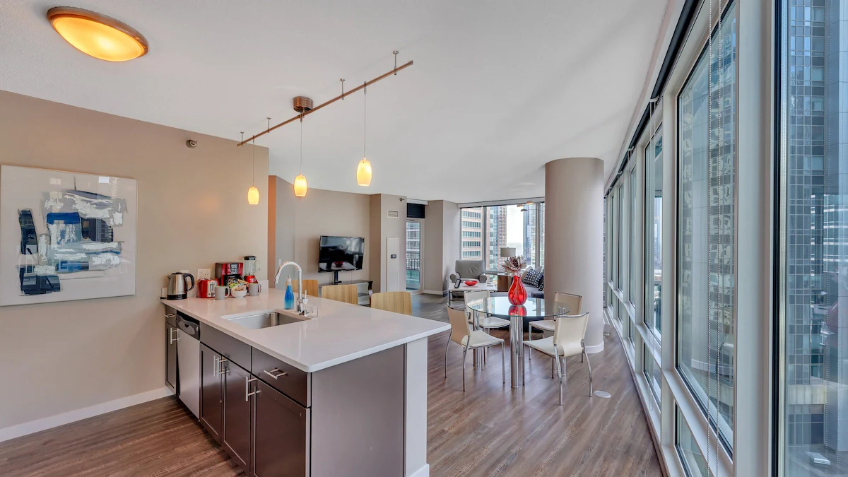 Group of professionals enjoying a luxury furnished corporate apartment in Downtown Chicago.