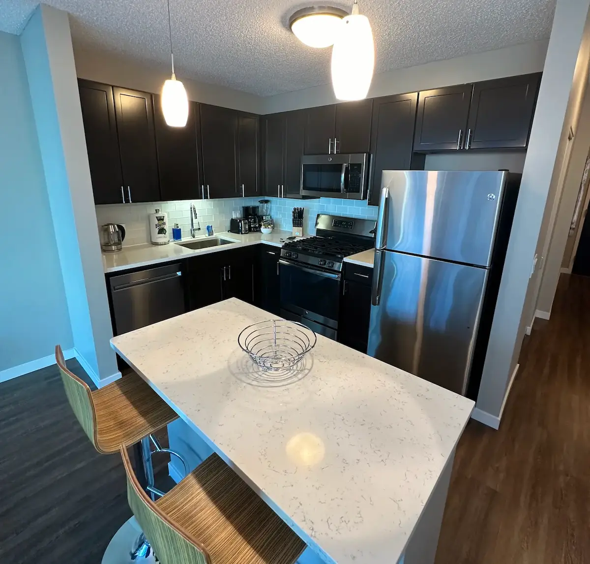 Group of professionals enjoying a luxury furnished corporate apartment in Downtown Chicago.