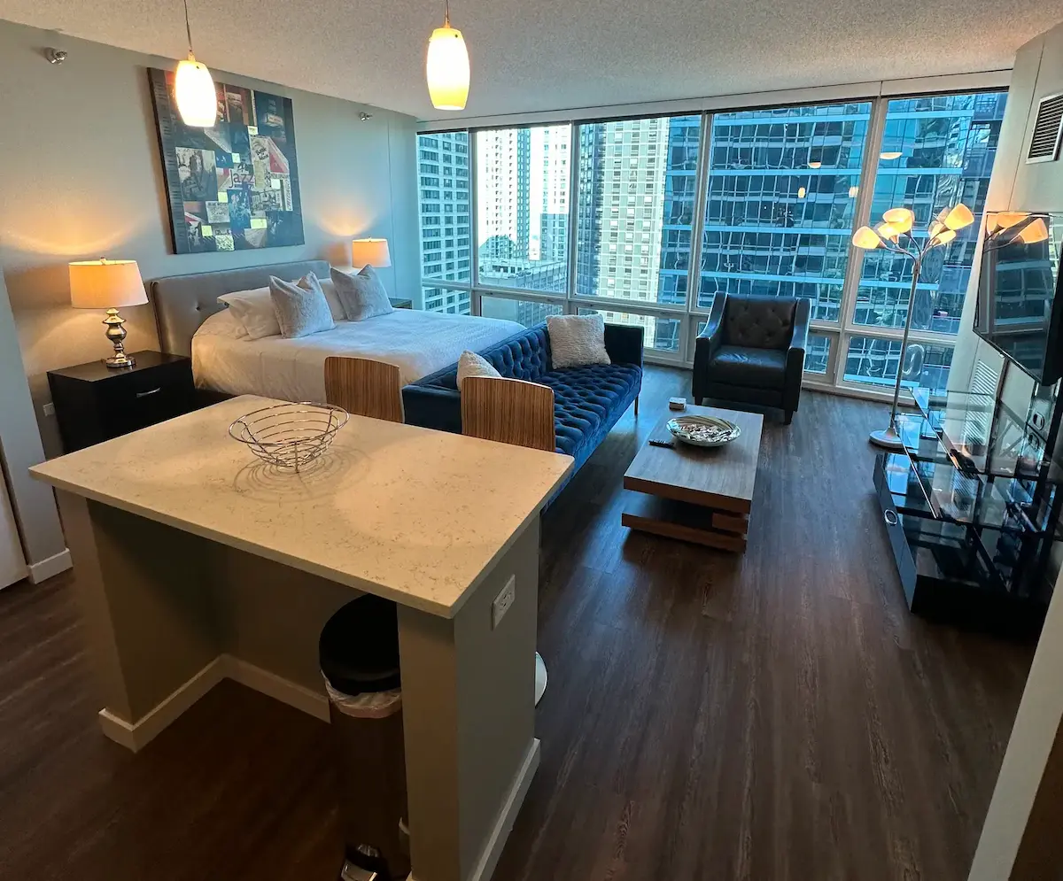 Group of professionals enjoying a luxury furnished corporate apartment in Downtown Chicago.