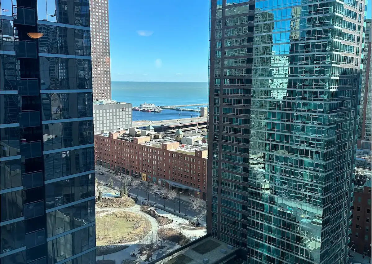 Group of professionals enjoying a luxury furnished corporate apartment in Downtown Chicago.